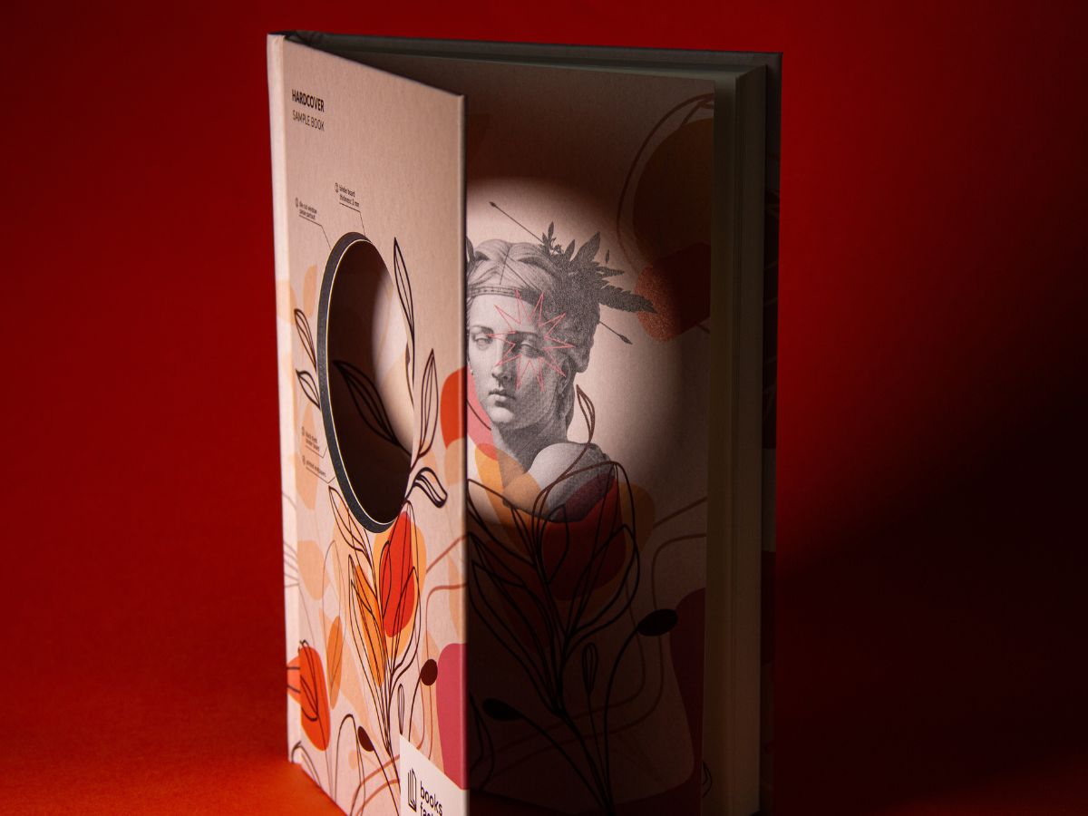Hardcover book with die-cut window.
