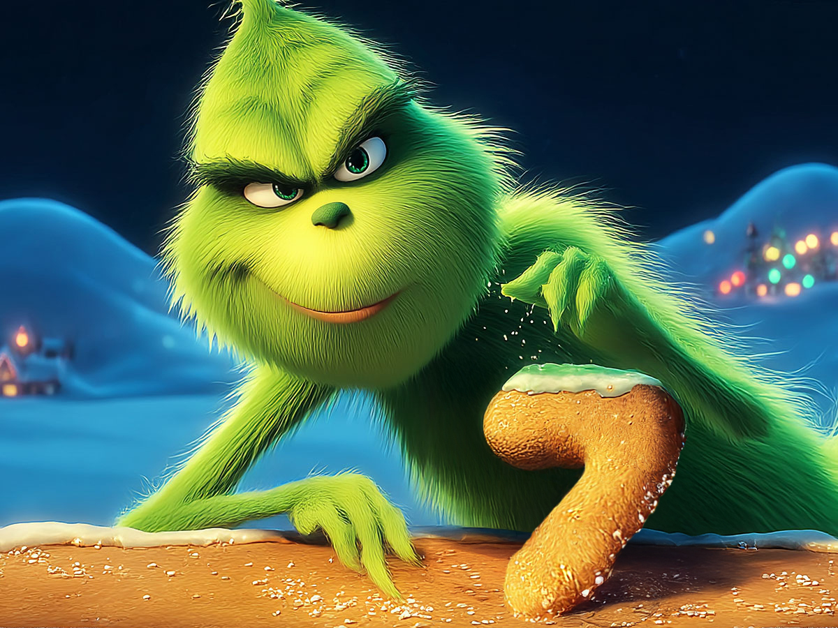 Zielony Grinch i piernikowa siódemka z zielonym lukrem.