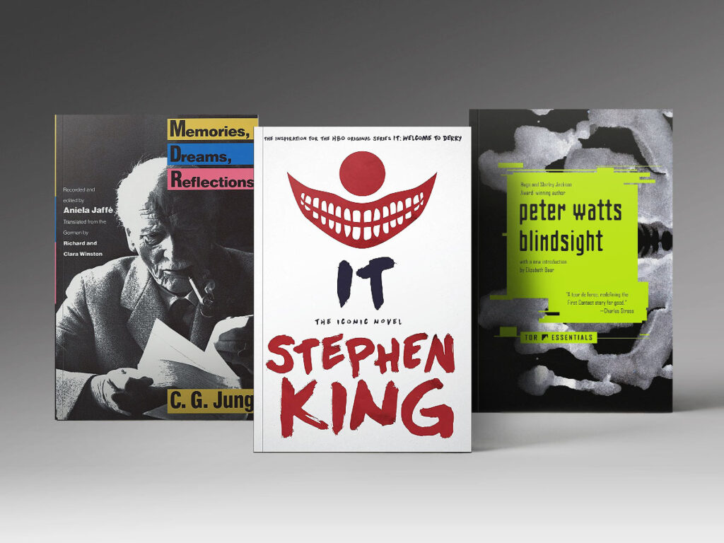 Three books: "Memories, Dreams, Reflections", "It", "Blindsight".